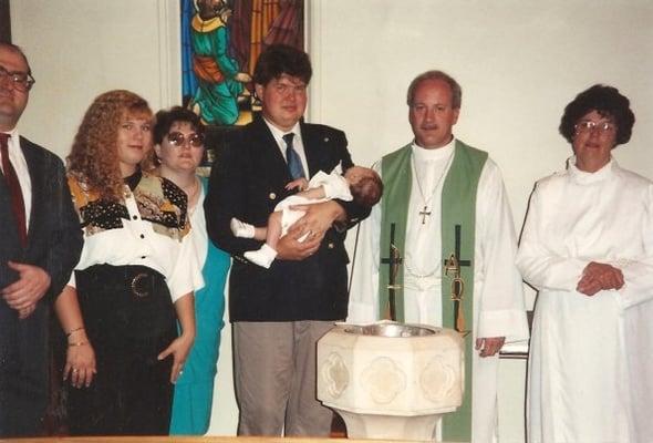 Alex's baptism with Canon Powers