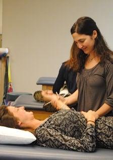 Christine Donadio, MSPT working with a patient at Blue Hills Sports & Spine Rehabilitation's Weymouth Office