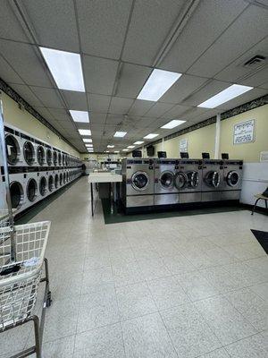 Spacious launder center with small, medium, washers. They have plenty of dryers.