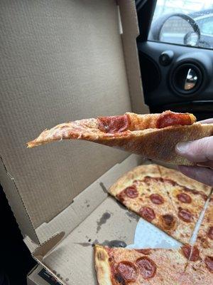 NY style, thin, foldable, will hold up, nice fresh crust.