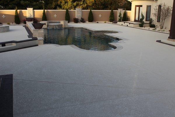 This pool deck knock down finish features a slip-resistant surface that helps prevent slips and falls. www.losangelesdecorativeconcrete.com