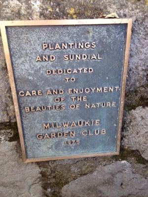 A plaque in the park.