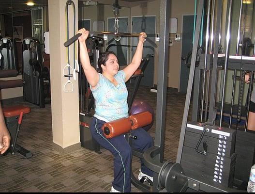 Doing Lat Pull Downs Will Rid Your Back Fat