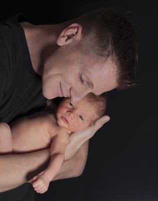 Father and 5-day old newborn baby.