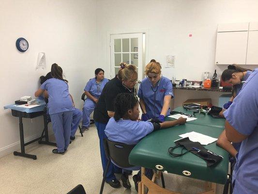 Medical Assistant Technician students hard at work.