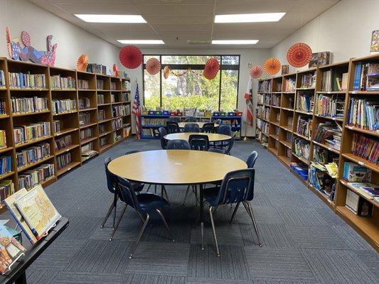 Students enjoy going to our library each week to check out books.