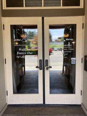 Company logo & hours door graphics.