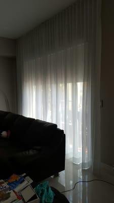 Ripple curtains with black out shades underneath.  Amazing!!!