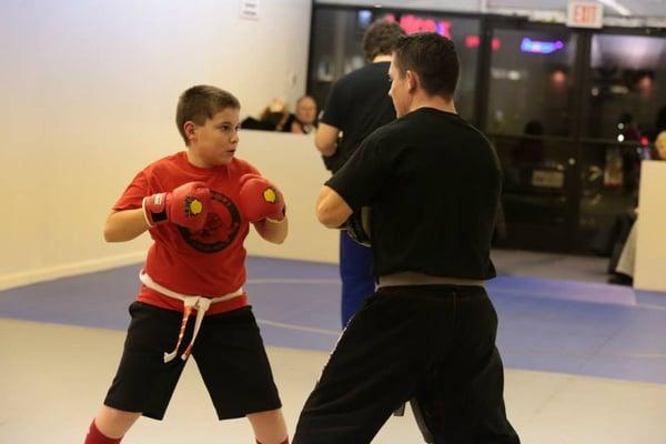 Striking class helps build self confidence. Keep those hands up to protect yourself