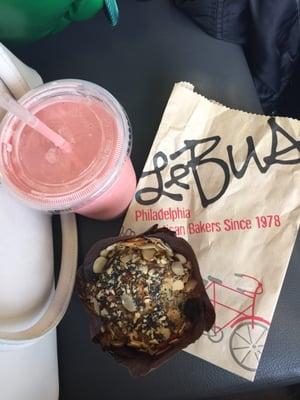 Banana and strawberry protein smoothie and a muffin.