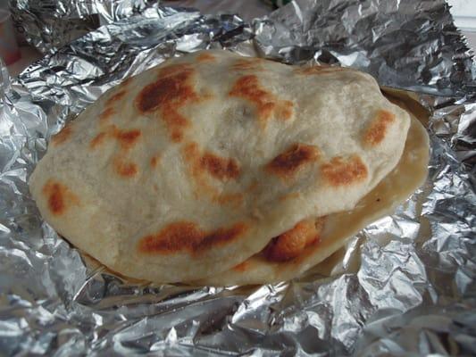 Jack cheese and chicken quesadilla! 'Yummy!  'Wrapped in foil when home delivered.