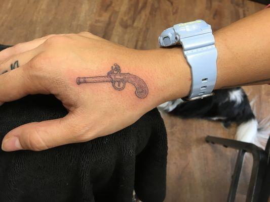 Tiny single needle gun tattoo I made