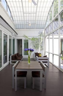 Dramatic arced ceiling in this contemporary Chevy Chase screened-in porch. Photo by Tim Bell