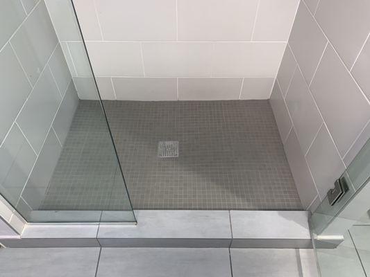 This is after cleaning and sealing the shower floors! 5 year warranty no questions asked!