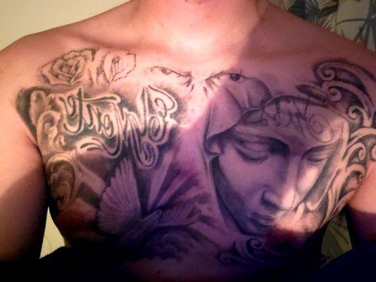 Virgin mary on chest