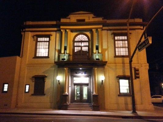 Historic building 1204 Middlefield at night.