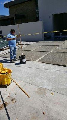 Grinded and sealed this driveway composed of concrete slabs