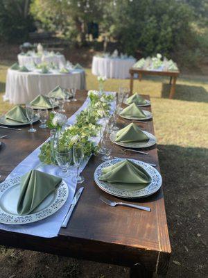 Fiesta King now offers charger plates, dinnerware, napkins and farm tables! Book yours online now at fiestakingrental.com