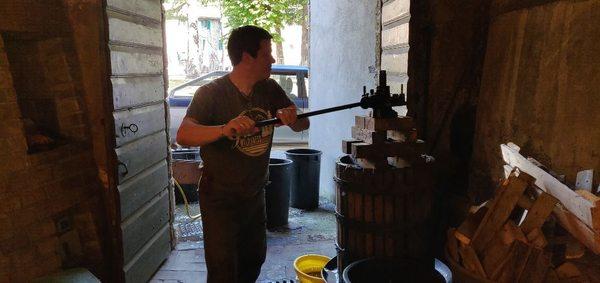 John making wine with my family in Italy.