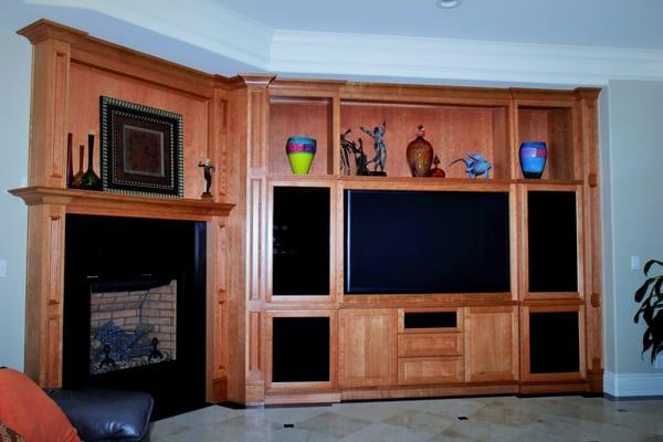 Stained maple entertainment center and fireplace mantel. Dublin CA