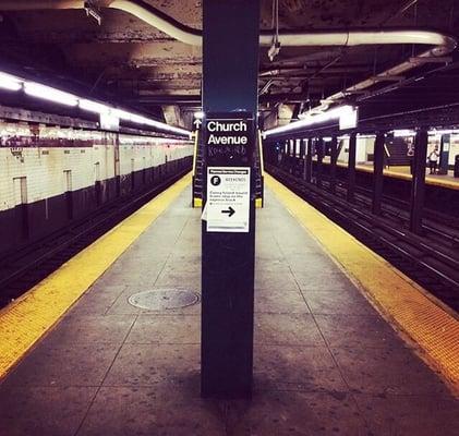 Typical 4 track express station with double island platforms.. Church ave is out the south end of the station.