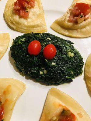 Garlic Spinach with Truffle Pierogis