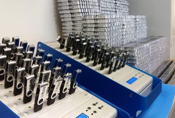 5000 flash drives being loaded with data in our San Francisco facility.