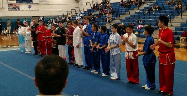 Rowan and Jonah await their medals at the 5th Seattle International Martial Arts Championship at Edmonds CC 8/18/19. Jiayou!!!