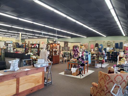 The interior of SAFE's Attic, featuring high-quality thrifted clothing, accessories and jewelry.