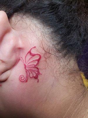 Ink behind the ear