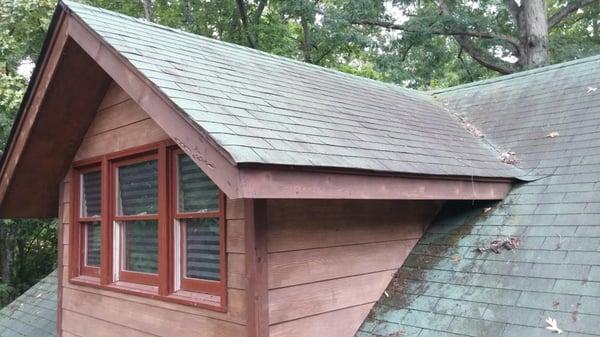 This is the condition of the roof when the home was purchased.  The three tab shingles were worn and stained.