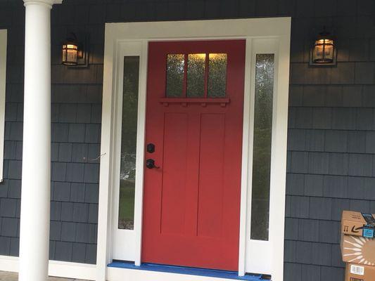 New fiberglass entry door with 12" sidelights and privacy glass