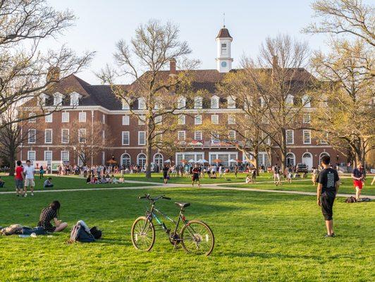 College community: Students take advantage of the sunny day, mingling and unwinding on campus