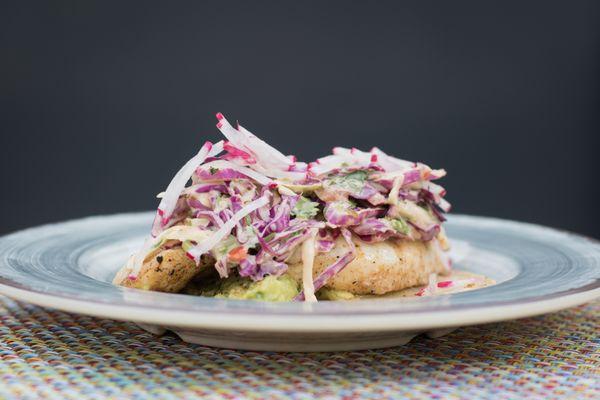 Baja Style Fish Taco, grilled mahi mahi, chipotle slaw, guacamole