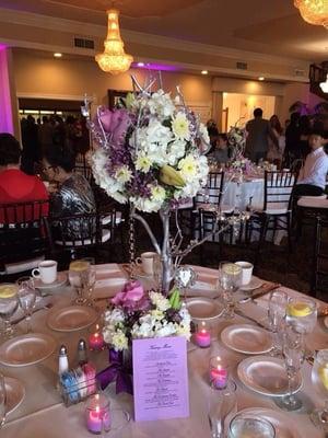 Loved the flowers on the a real tree branch for our centerpiece arrangement. My guests all wanted to take it home!