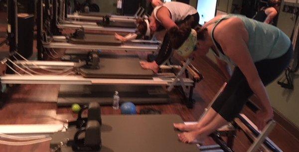 Tendon stretch on Reformer .. pretty advanced move..