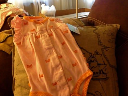 Onesie with little embroidered crabs.