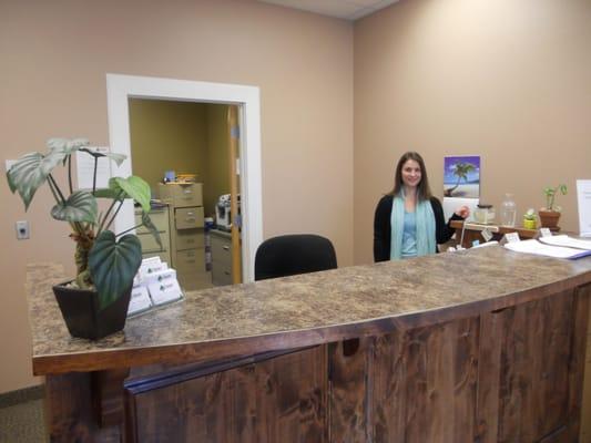 Reception desk and our friendly receptionist, Lacey.