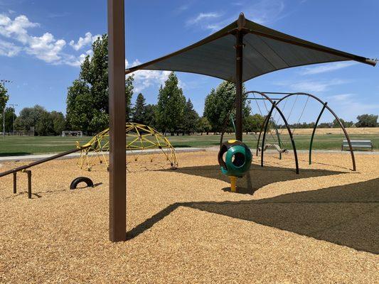 Seesaw, climbing dome, spinning, and shade!