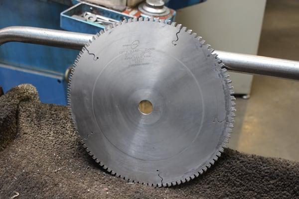 A carbide blade undergoing the process of refurbishment,