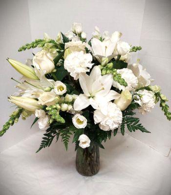 All white sympathy arrangement. Size and price may vary