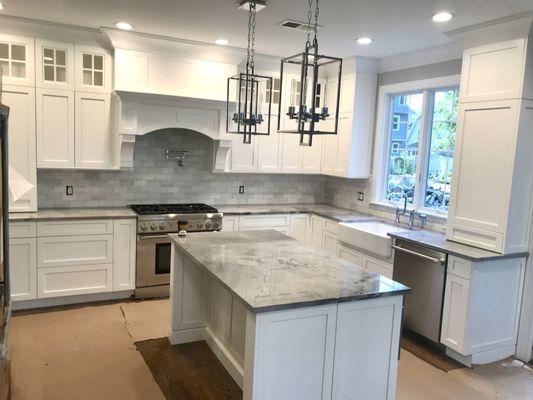 Kitchen counters installed with a beautiful backsplash!