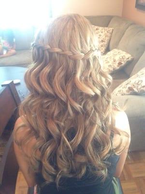 Waterfall braid with loose curls.