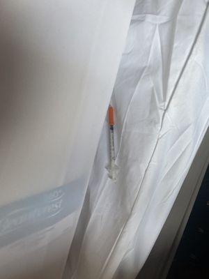 Used syringe in our bed