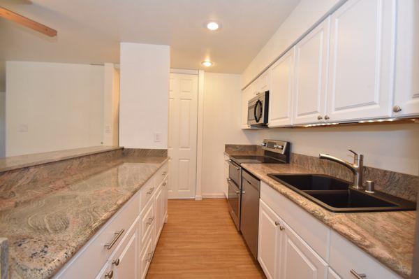 Granite countertops in upgraded apartments.