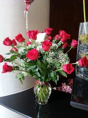 2 dozen long stem red roses