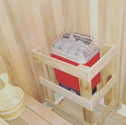 Sauna heater in custom sauna.