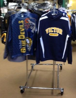 We have many printed and embroidered Victor Blue Devils products in stock.  Buy on site or on our website