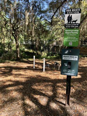 Dog Waste Station by parking lot