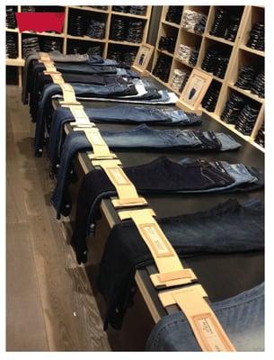 Hand stitched leather and steel store fixtures for Levi's